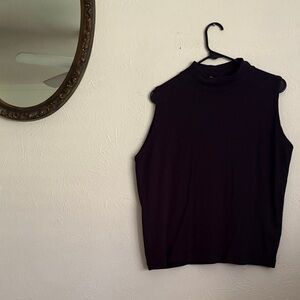 FLASH SALE | LEAVING THIS WEEK! 
Navy Mock Neck Sleeveless Top